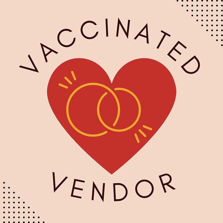 a red heart with two gold rings on a peach background. vaccinated vendor floats above and below the heart.